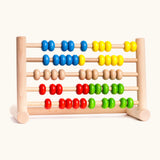 Bajo wooden wide abacus standing  upright showing the different coloured beads and unpainted frame 