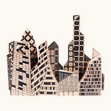 Bajo city puzzle set showing different shaped wooden building pieces with black painted detailing