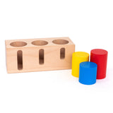 Bajo deep and shallow shape sorter puzzle set available at Babipur. The rectangular shape wooden base standing next to the different sized and coloured tubes.