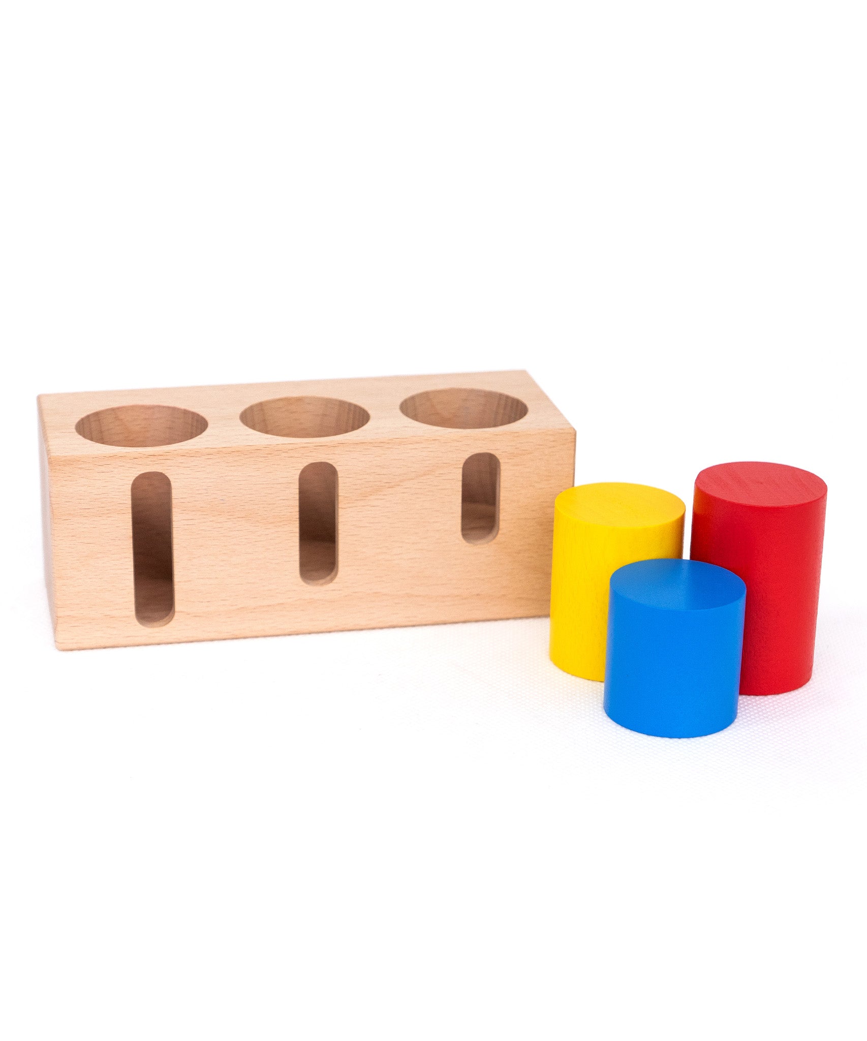 Bajo deep and shallow shape sorter puzzle set available at Babipur. The rectangular shape wooden base standing next to the different sized and coloured tubes.