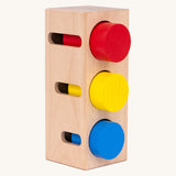 Bajo deep and shallow shape sorter puzzle set available at Babipur. A rectangular shape base standing upright with the with 3 different coloured tubes inside the deep cut outs
