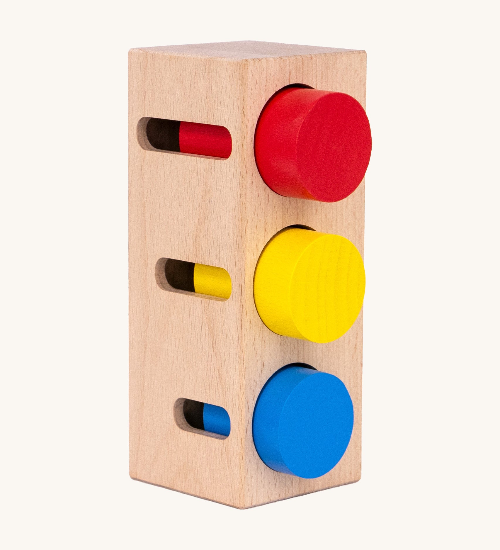 Bajo deep and shallow shape sorter puzzle set available at Babipur. A rectangular shape base standing upright with the with 3 different coloured tubes inside the deep cut outs