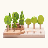 Bajo forest central park set showing the wooden boards stacked with trees pieces inserted in the holes