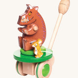 Bajo Gruffalo & Mouse Push Along toy is a wooden two-in-one toy for toddlers, including the Gruffalo and Mouse figures. The section where the brown Gruffalo and mouse are sat moves round and round, and the wooden Gruffalo toy can be removed from this section