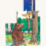 One side of the Bajo Gruffalo Wooden Block Puzzle showing a woodland scene of the Gruffalo and Owl, with a blue block on top showing the other side of the puzzle blocks