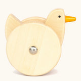Side of Bajo wooden wobbling chicken toy showing large wheel on the side 