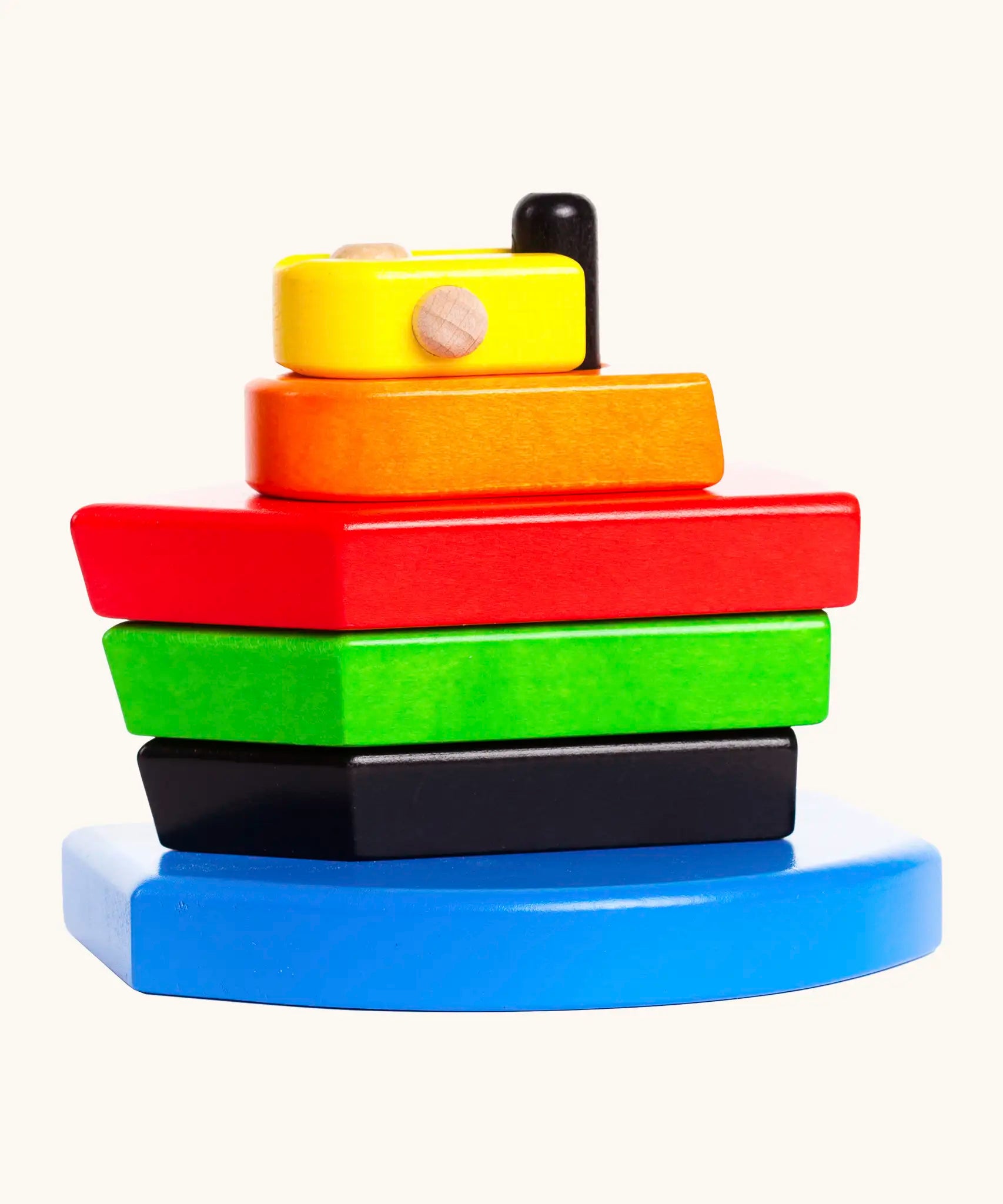 Bajo nemo stacker toy showing brightly coloured wooden pieces stacked into a boat structure