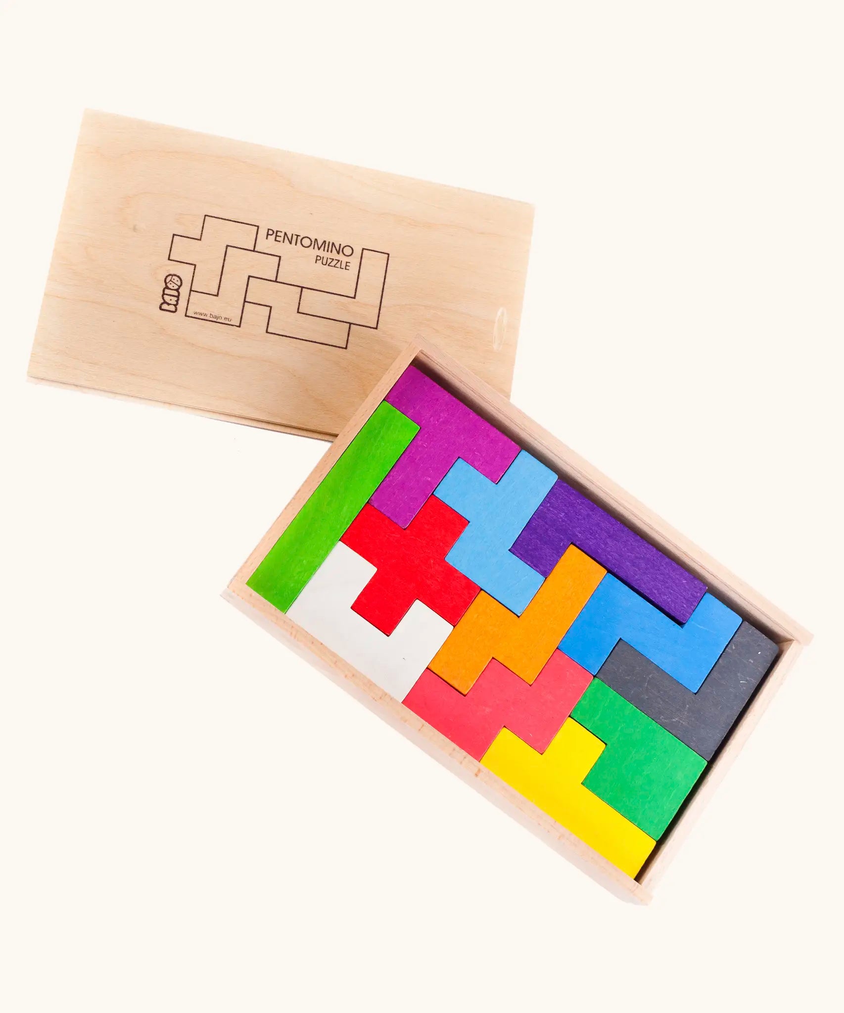 Bajo pentomino set showing different 3d wooden coloured blocks inside a wooden storage box.