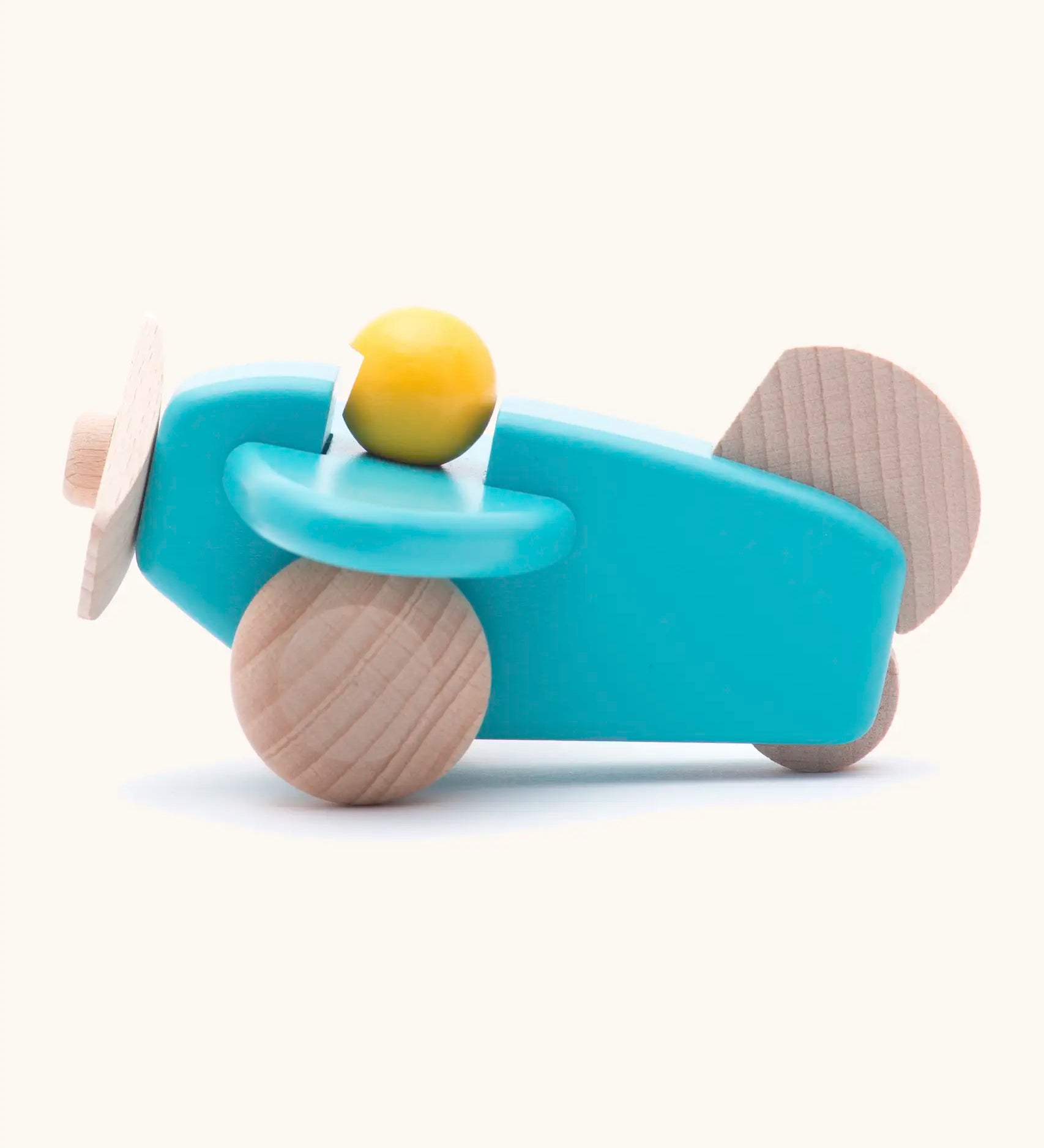 Bajo wooden light blue plane with a yellow pilot, unpainted wheels, propellors and rudder
