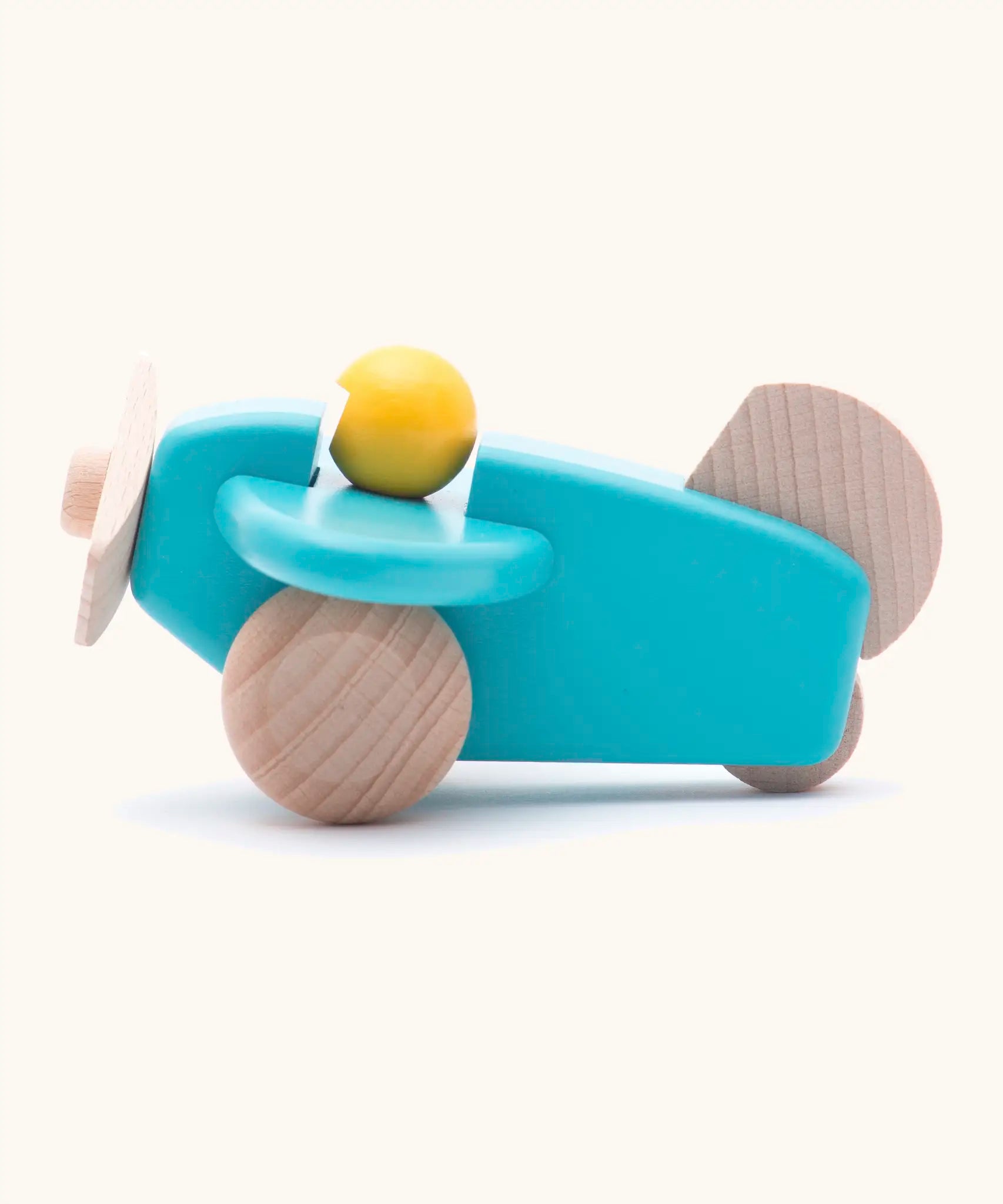 Bajo wooden light blue plane with a yellow pilot, unpainted wheels, propellors and rudder