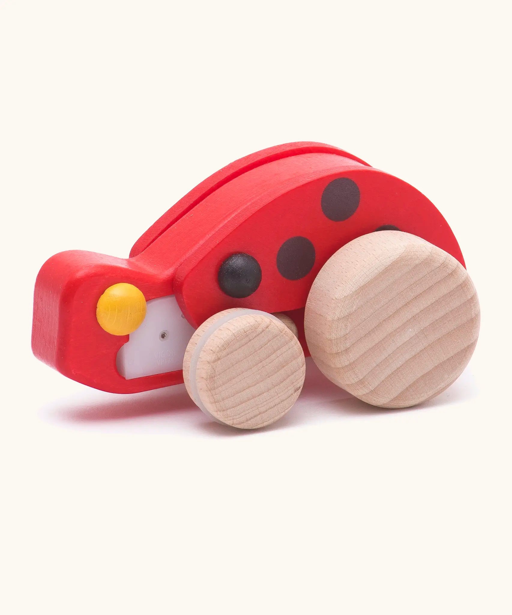 Bajo Pull-Back Ladybird toy with natural wooden wheels