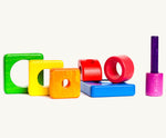 Different coloured wooden pieces from the Bajo tower puzzle stacker set 