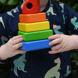 Child holding the Bajo Puzzle Stacker Tower in his hands.