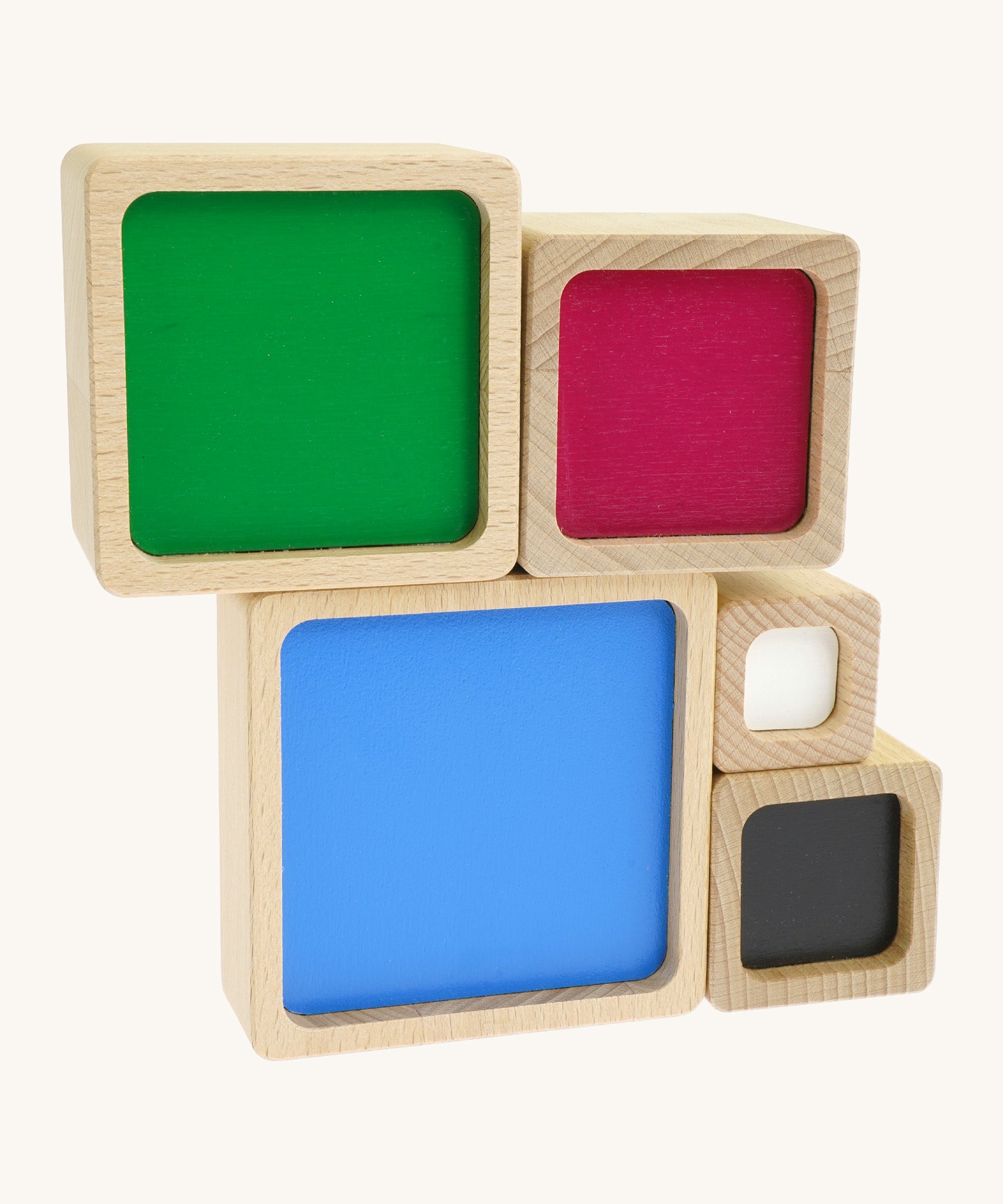 A simple setup made from the Bajo squaremide sensory wooden blocks available at Babipur. Each block is showing its coloured base.