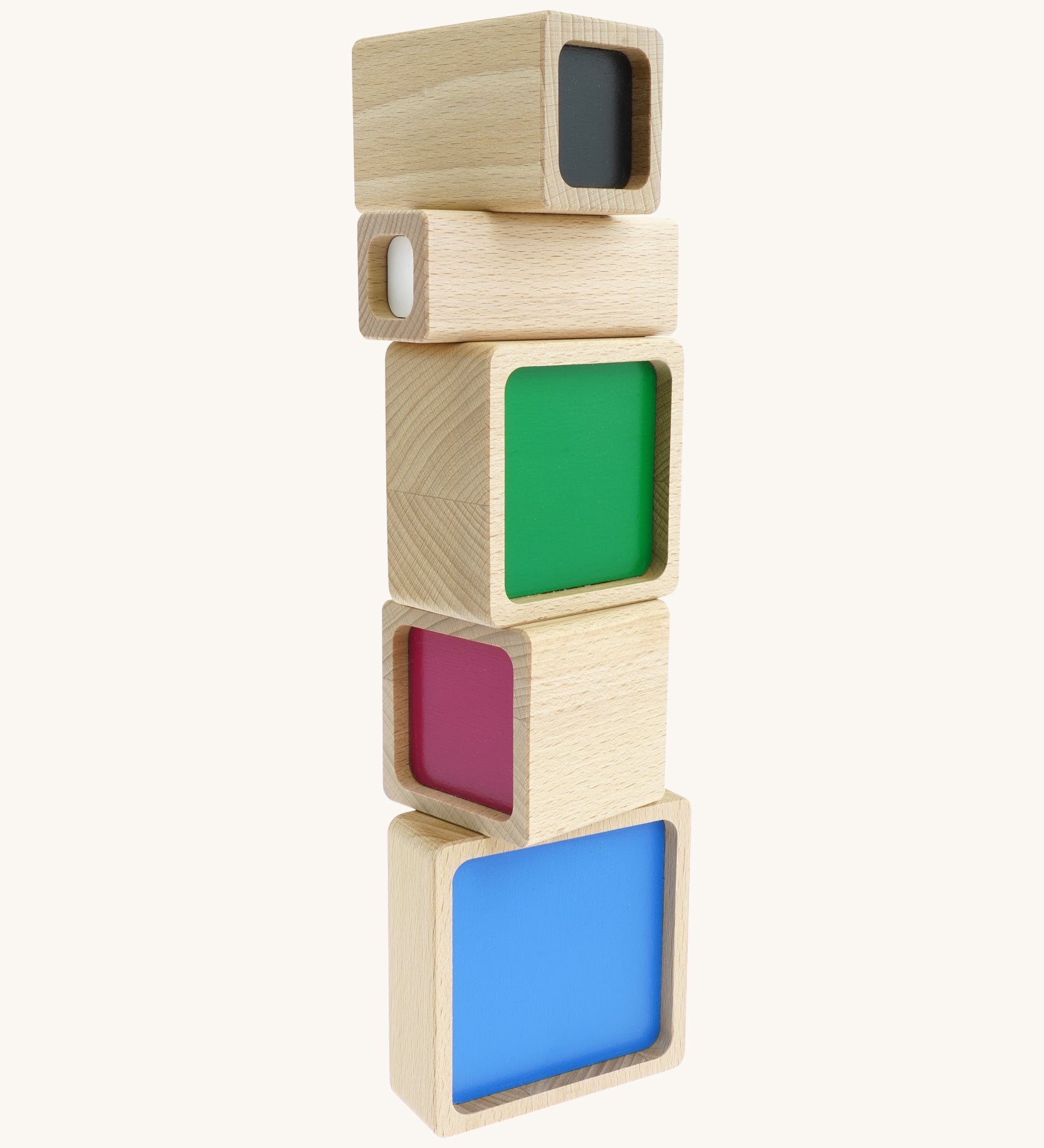 A tower stack made Bajo squaremide sensory wooden blocks available at Babipur. Each block is showing its coloured base.