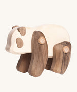 Tobe Wooden Panda baby toy, is beautifully crated in two tone wood, with a white body, dark brown arms and legs, dark brown ears and eye patches. This wonderful wooden toy has movable arms and legs, and is on a cream background