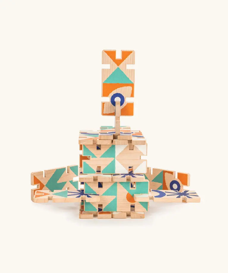 Bajo wooden domino pieces with abstract designs made into a 3D structure