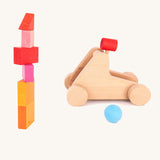 A simple block stack with the Bajo wooden catapult toy set available available at Babipur ready to shoot down the tower. 