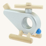 A side photo of the Bajo wooden police helicopter available at Babipur. This helicopter is silver with movable propellors and a circular window 