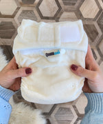 Bambinex newborn and baby Bamboo cloth nappy in hands, fits up to 20lbs, sold at Babipur.