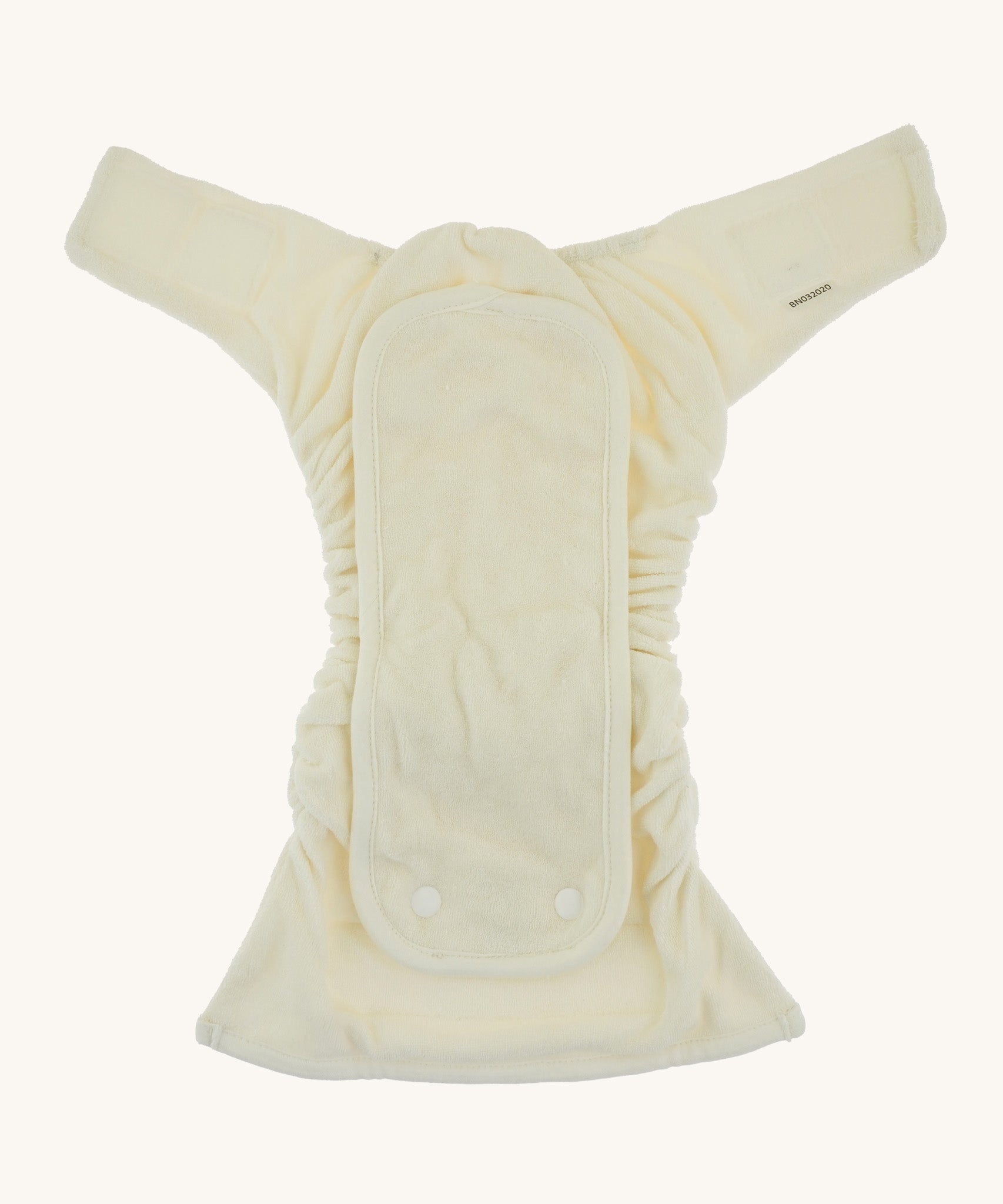 A open Bambinex bamboo nappies available at Babipur. Features a velcro fastener and added bamboo booster for extra absorbency.