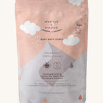 pink with white clouds baby bath soaks pouch on a cream background.