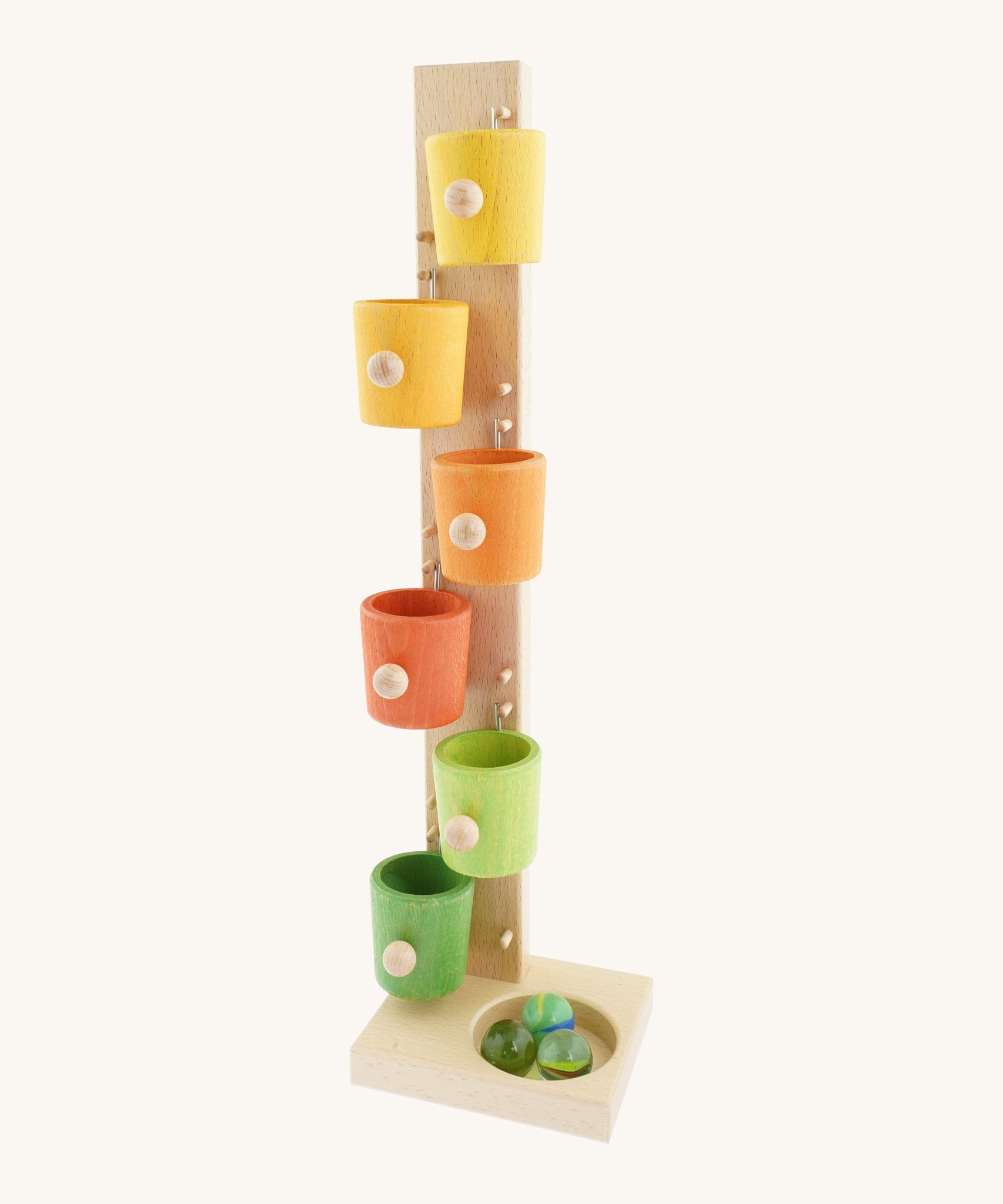 A Beck coloured roller cup marble run available at Babipur. A tower style marble run set with 6 lightly coloured tilting cups and 3 big marbles.