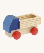 Beck wooden lorry toy available at Babipur. This lorry has a blue cab, unpainted trailer and red wheels.