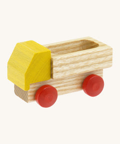 Beck wooden lorry toy available at Babipur. This lorry has a yellow cab, unpainted trailer and red wheels.
