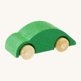 Beck wooden speedy race car toy in green available at Babipur. This wooden car toy is in a classic beetle shape with a green body and unpainted wheels