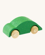 Beck wooden speedy race car toy in green available at Babipur. This wooden car toy is in a classic beetle shape with a green body and unpainted wheels