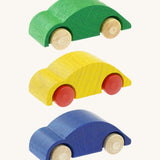 Beck wooden speedy race car toy in blue, green and yellow available at Babipur. These wooden car toys have a  classic beetle shape with the yellow car having red wheels