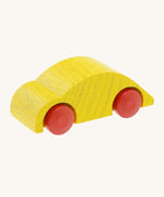 Beck wooden speedy race car toy in yellow available at Babipur. This wooden car toy is in a classic beetle shape with a yellow body and red wheels