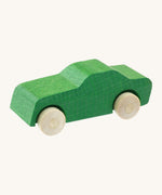 Beck wooden toy passenger car available at Babipur. This vehicle has a green body and unpainted wheels