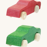 Beck wooden toy passenger cars in red and green available at Babipur. 