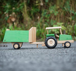Beck Holzspielzeug wooden toy tractor and horse trailer attachment for wooden animals.