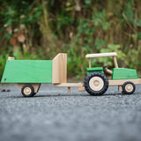 Beck Holzspielzeug wooden toy tractor and horse trailer attachment for wooden animals.