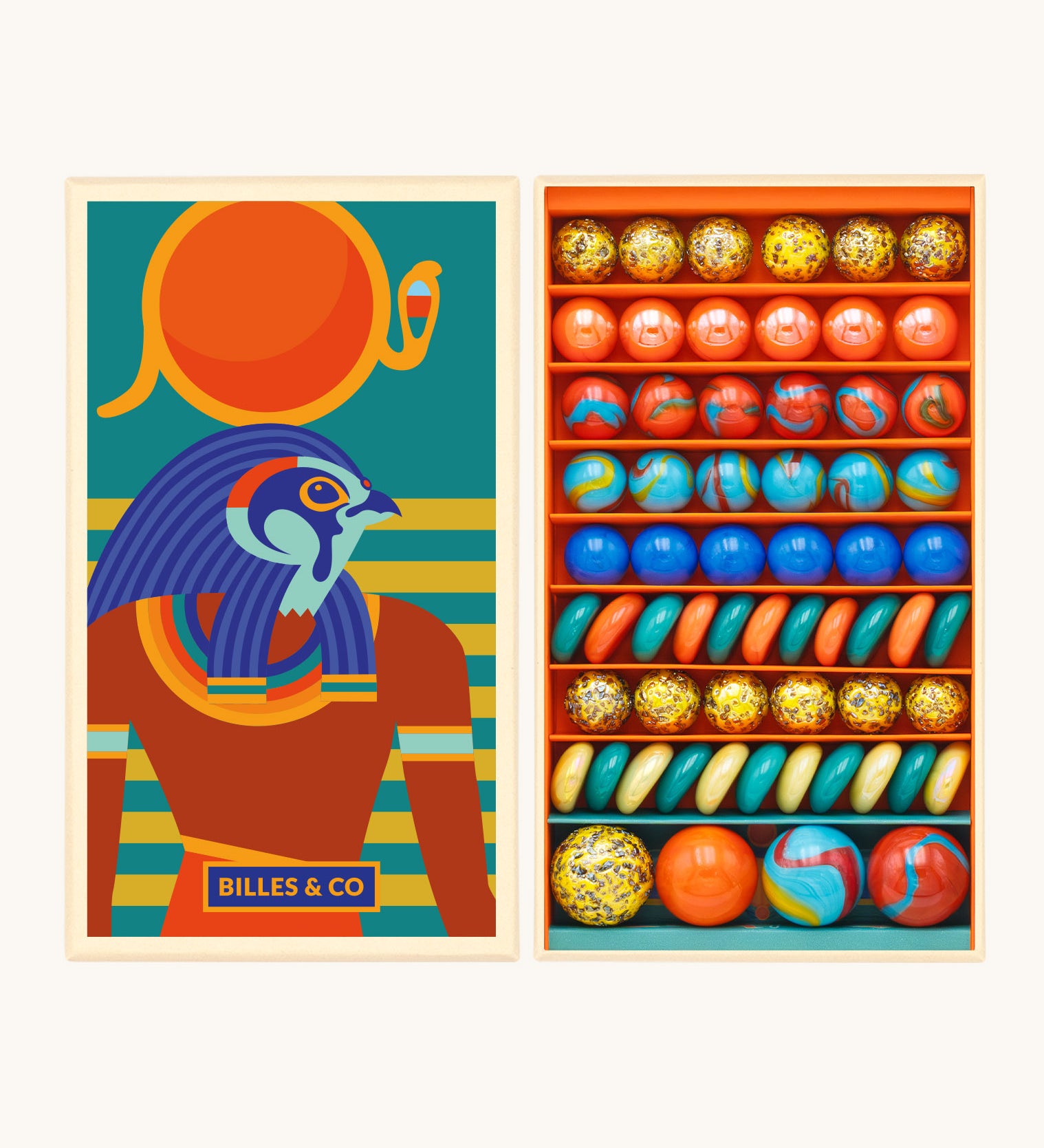 Billes & Co Horus marble balls set available at Babipur. A box of 62 marbles and pebbles in Horus inspired colours. Set comes in a cardboard box with a Horus god on the front.