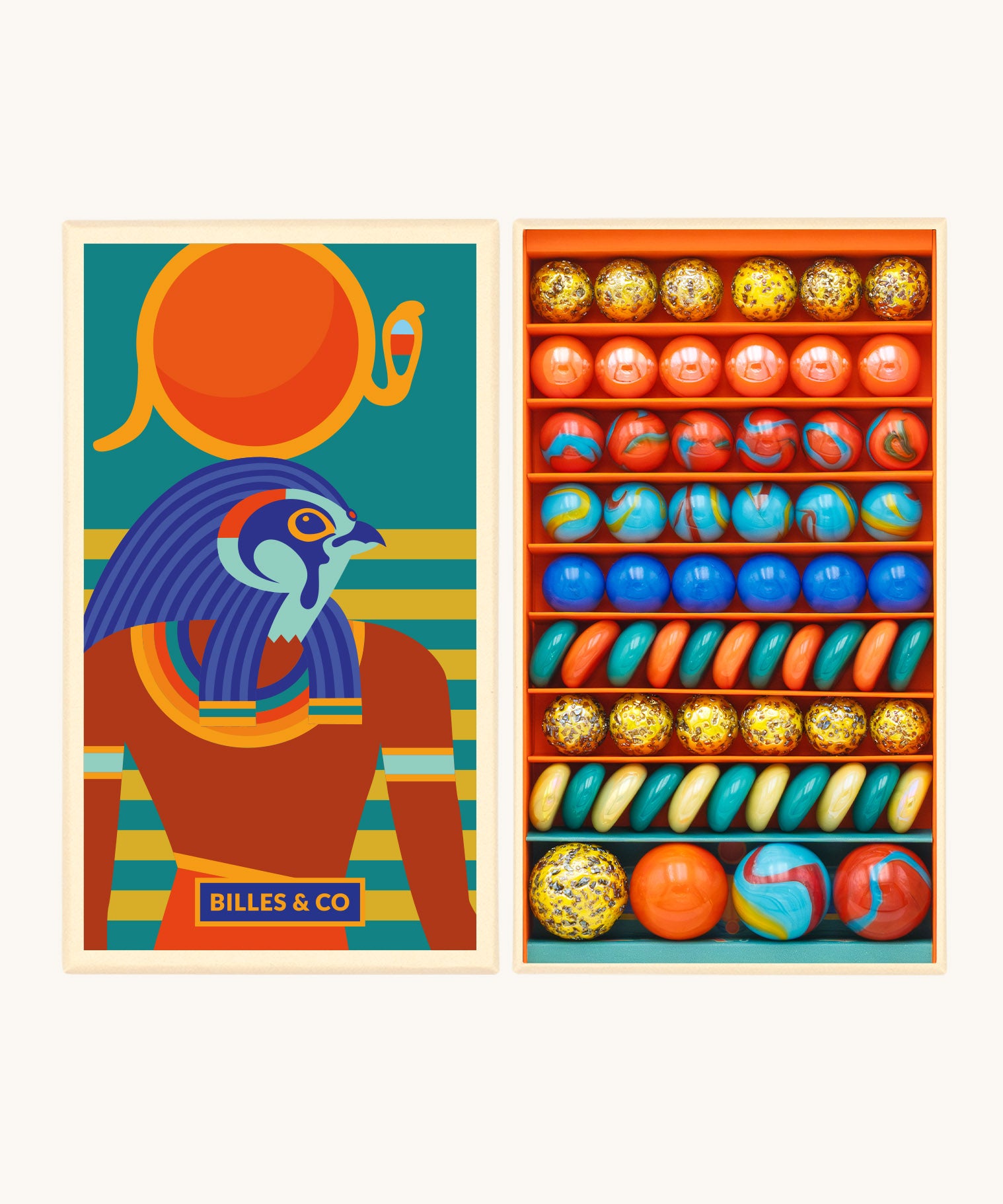 Billes & Co Horus marble balls set available at Babipur. A box of 62 marbles and pebbles in Horus inspired colours. Set comes in a cardboard box with a Horus god on the front.