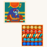Billes & Co Horus mini marble box available at Babipur. A box of 29 marbles and pebbles in Horus inspired colours. Set comes in a cardboard box with a Horus god on the front.