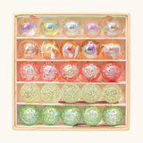 Billes & Co pink fairy marble mini box showing individual round glass marbles in pastel colours inside cardboard packaging