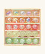 Billes & Co pink fairy marble mini box showing individual round glass marbles in pastel colours inside cardboard packaging
