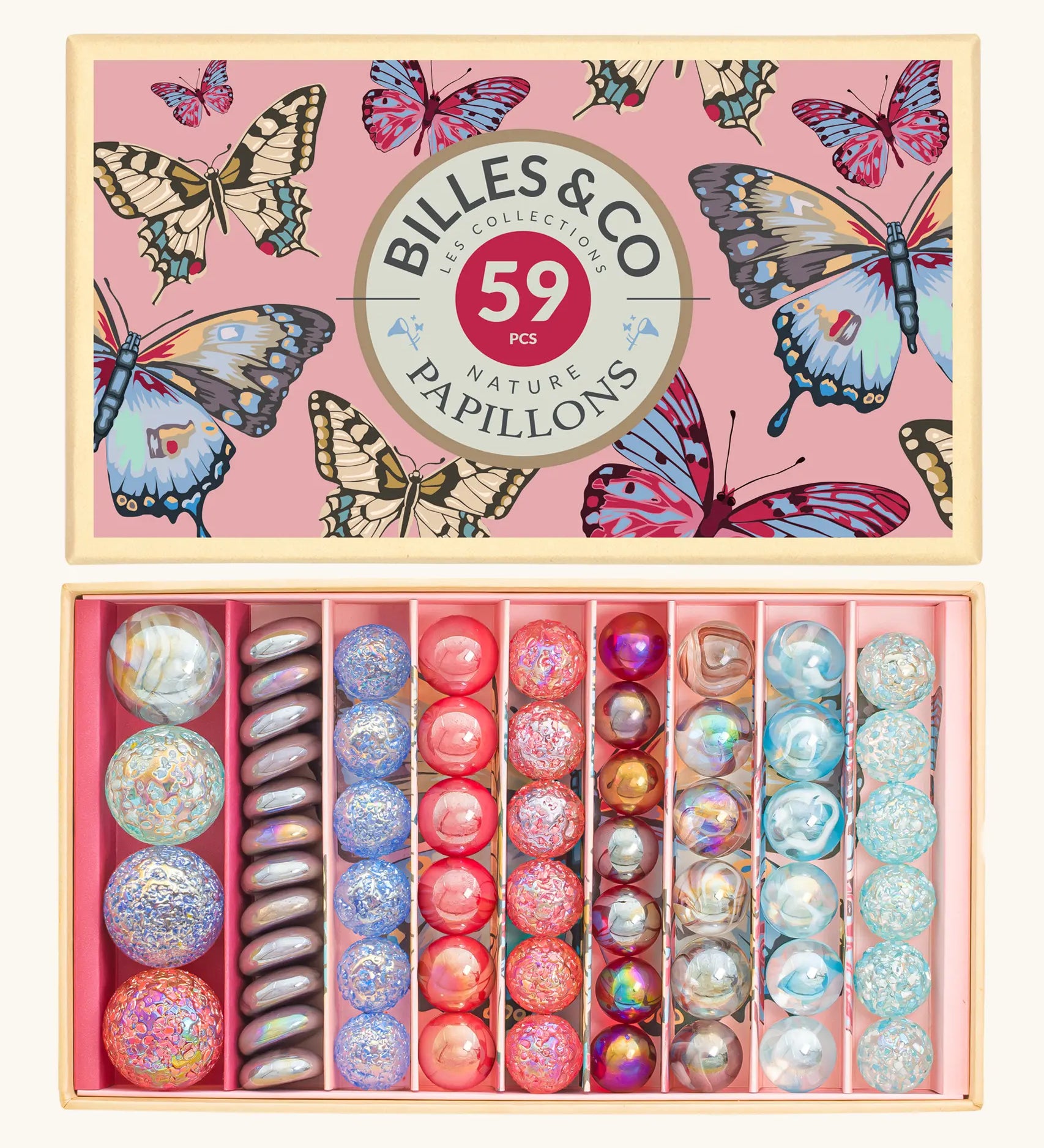 Billes & Co butterfly anamorphic glass marble set presented in a butterfly gift box. The marbles are lined up in order of size and pastel colours.