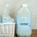 A close up of the 5L bottle of Bio-D all purpose sanitiser refill in fragrance free next to a 500ml bottle, both available at Babipur.