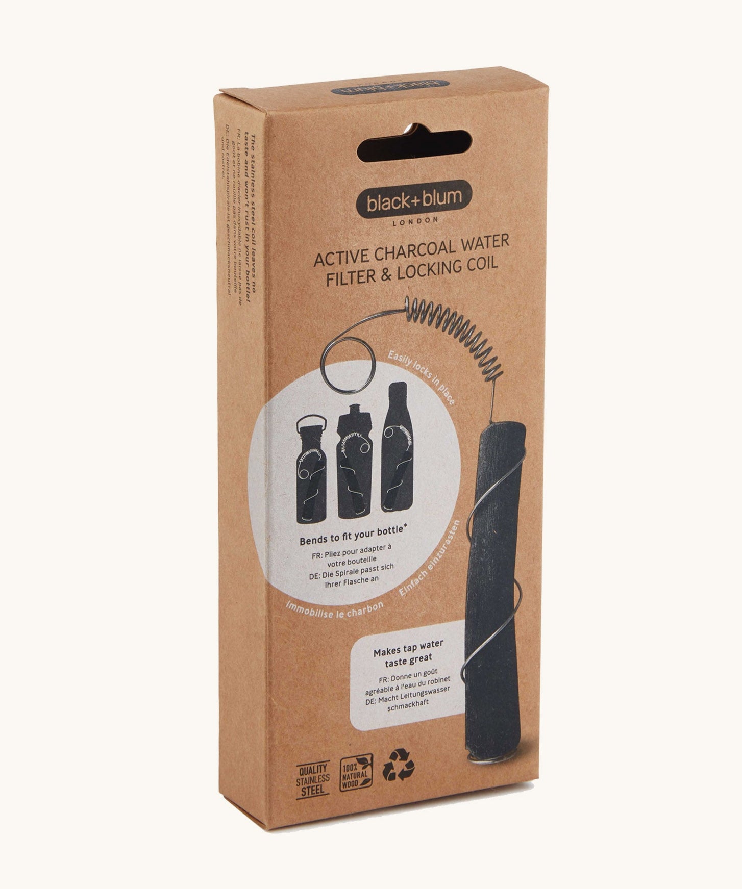 A close up of the brown cardboard packaging holding the Black + Blum active charcoal water filter with metal coil 