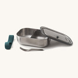 Black+Blum Large Leak Proof Stainless Steel Lunch Box with ocean blue coloured strap. The lid is shown resting on the side of the lunchbox with the strap and fork besides it. This lunchbox is part of a wide range of stainless steel lunch box options available here at Babipur. 