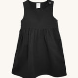 The Eco Outfitters organic and fair trade cotton school pinafore dress in black.