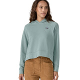 A person wearing the Patagonia Women's Regenerative Essential Hoody in light blue