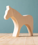 Bumbu paint your own wooden toy horse. A smooth and natural finish with wood grain showing.