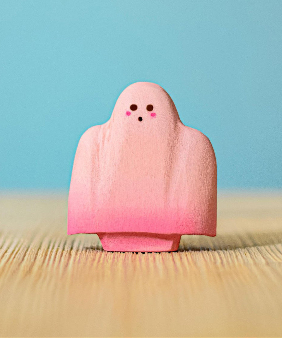 Bumbu handmade and hand painted wooden pink ghost figure available at Babipur.